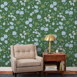 Cascade Meadow (Juniper) featuring hand drawn flowers in light blue and yellow on a green background | Schoolhouse x Hygge & West