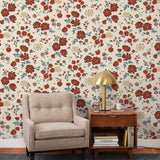 Cascade Meadow (Primary) featuring hand drawn flowers in shades of red and green on a cream background | Schoolhouse x Hygge & West Wallpaper Collection