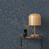 Alpine Garden Tonal (Midnight) featuring hand drawn flowers in metallic gold on a deep blue background | Schoolhouse x Hygge & West Wallpaper Collection