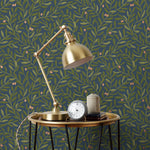 Olive Grove (Midnight) featuring a leafy vine motif in shades of green with metallic copper accents on a deep blue background | Schoolhouse x Hygge & West Wallpaper Collection