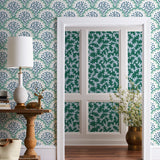 Angelina (Laurel) wallpaper features a White background with graduated green scallops and navy floral motif