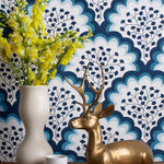 Angelina (Navy) wallpaper features a White background with graduated blue scallops and navy floral motif
