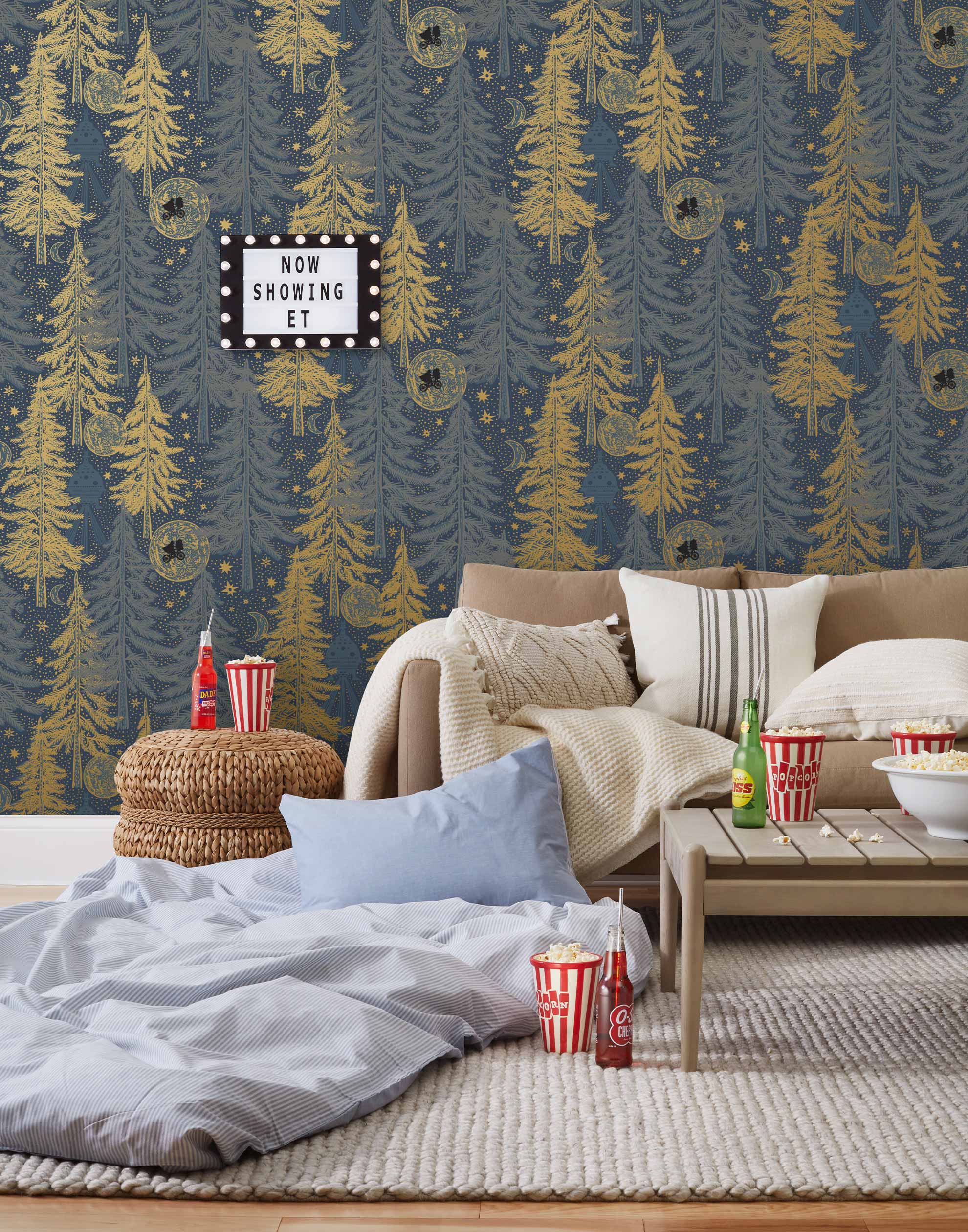 Be Good (Midnight) Wallpaper with light gray and gold illustrations on a deep gray background depicts scenes from the iconic movie E.T. the Extra-Terrestrial and was created in collaboration with Universal | Hygge & West