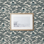 Amity Sunset (Ink) Wallpaper with dark blue and off white illustrations depicts scenes from the iconic movie Jaws and was created in collaboration with Universal | Hygge & West