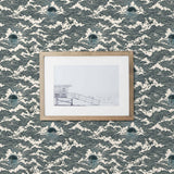 Amity Sunset (Ink) Wallpaper with dark blue and off white illustrations depicts scenes from the iconic movie Jaws and was created in collaboration with Universal | Hygge & West