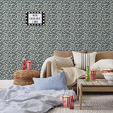 Amity Sunset (Ink) Wallpaper with dark blue and off white illustrations depicts scenes from the iconic movie Jaws and was created in collaboration with Universal | Hygge & West