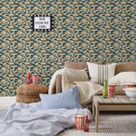 Amity Sunset (Indigo) Wallpaper with navy blue, white, and orange illustrations depicts scenes from the iconic movie Jaws and was created in collaboration with Universal | Hygge & West