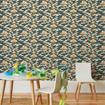 Amity Sunset (Indigo) Wallpaper with navy blue, white, and orange illustrations depicts scenes from the iconic movie Jaws and was created in collaboration with Universal | Hygge & West