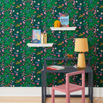 Cheetah's Garden (Emerald) wallpaper features Animals and fairies in a garden | dark green wallpaper with pink, red, yellow and purple illustrations | designed by Vikki Chu