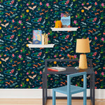 Space Owl (Midnight) wallpaper features wildlife, fauna and a flowing river | deep blue wallpaper with orange, white, brown, yellow, and green illustrations | designed by Vikki Chu