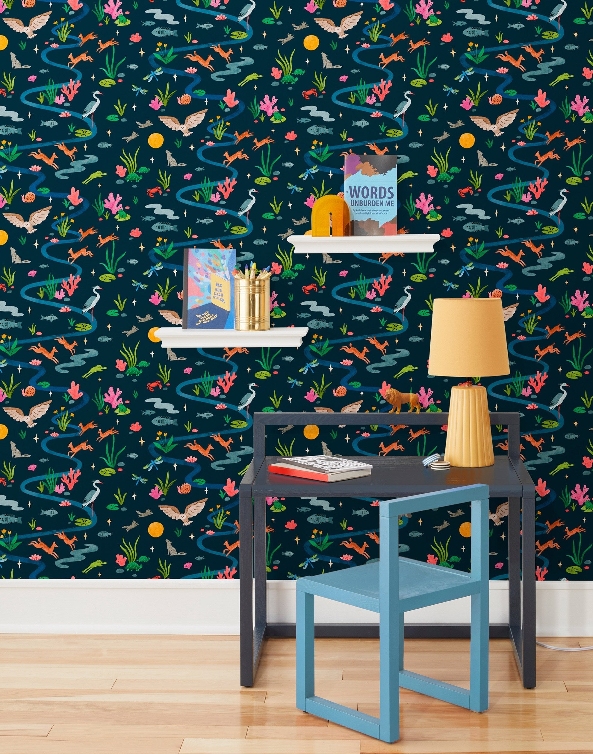 Space Owl (Midnight) wallpaper features wildlife, fauna and a flowing river | deep blue wallpaper with orange, white, brown, yellow, and green illustrations | designed by Vikki Chu