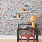 Space Owl (Gray) wallpaper features wildlife, fauna and a flowing river | light gray wallpaper with orange, white, brown, and green illustrations | designed by Vikki Chu