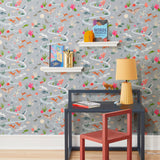 Space Owl (Gray) wallpaper features wildlife, fauna and a flowing river | light gray wallpaper with orange, white, brown, and green illustrations | designed by Vikki Chu
