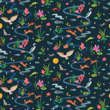 Space Owl (Midnight) wallpaper features wildlife, fauna and a flowing river | deep blue wallpaper with orange, white, brown, yellow, and green illustrations | designed by Vikki Chu