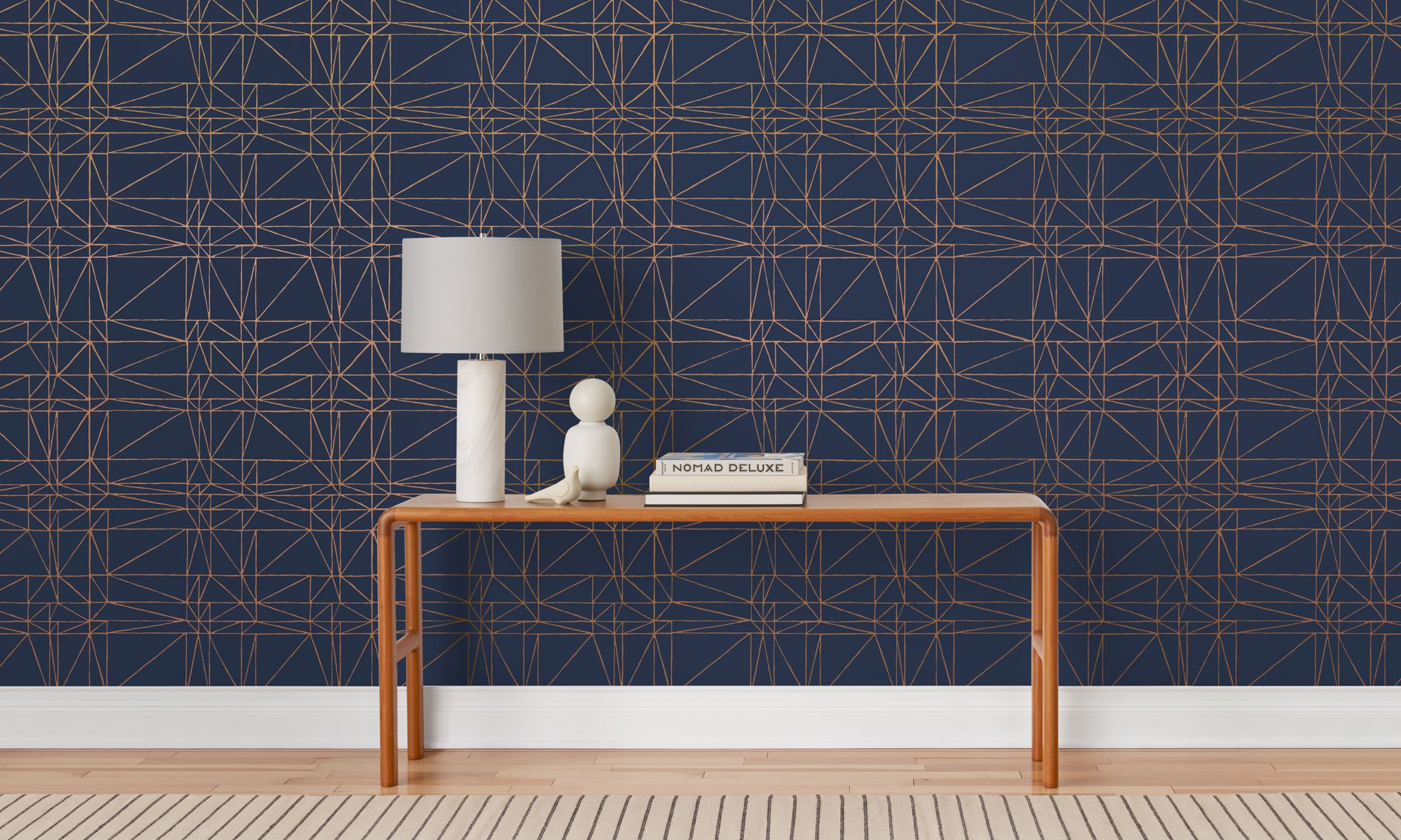 Strike (Navy) features modern, geometric metallic gold lines on navy blue